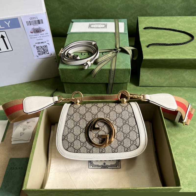 G*u*i satchel bags